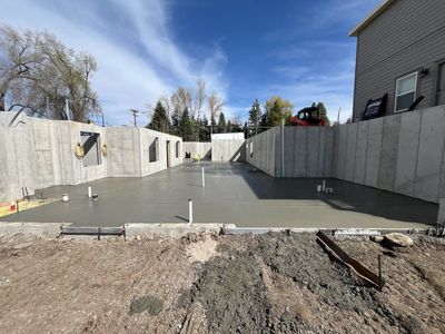 Shed Pads | Driveway Extensions | Sidewalks | Retaining Walls | Waterproofing | Concrete | Butterfield Builders