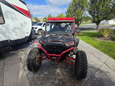 Polaris RZR UTV Side-by-Side with Vent Racing Roof and Triple X Seats