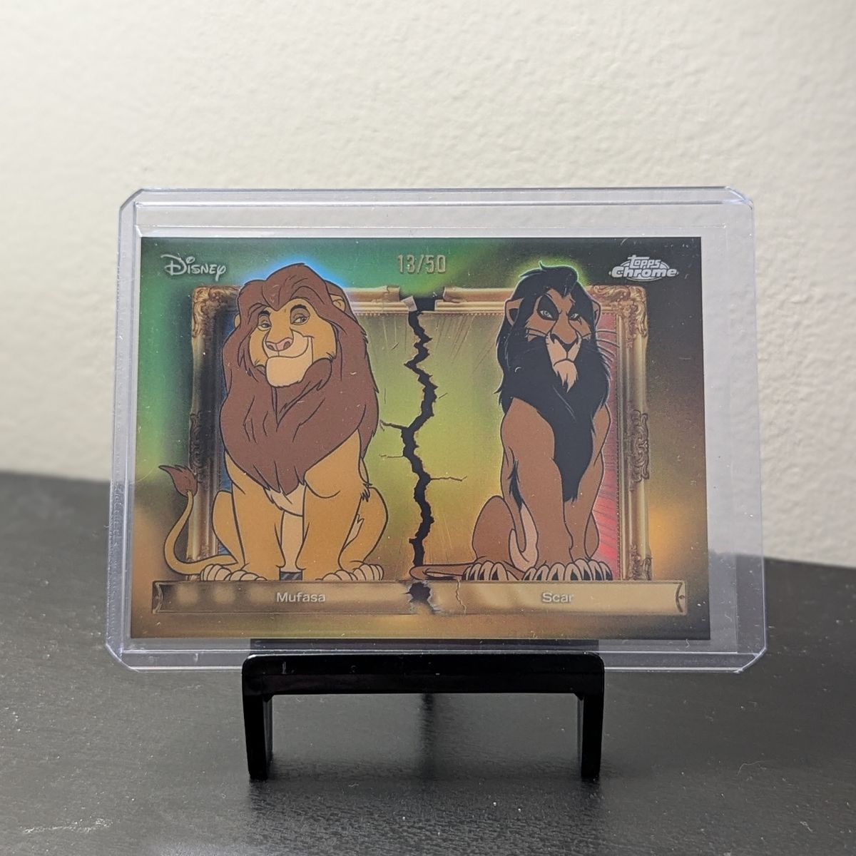 2025 Topps Disney Neon Family First Rivals Mufasa & Scar /50