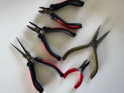 Husky Pliers- a set of three + two other pliers $7.98 three new and the other two are used