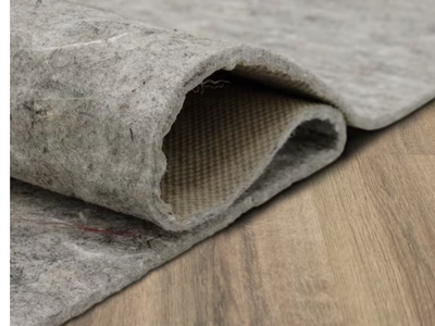 New in Package 9 ft. x 12 ft. 1/4 in. Dual Surface Rug Pad