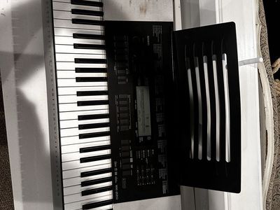 Casio CT-X700 Portable Electronic Keyboard with Stand - 61 Touch-Sensitive Keys, AiX Sound Source