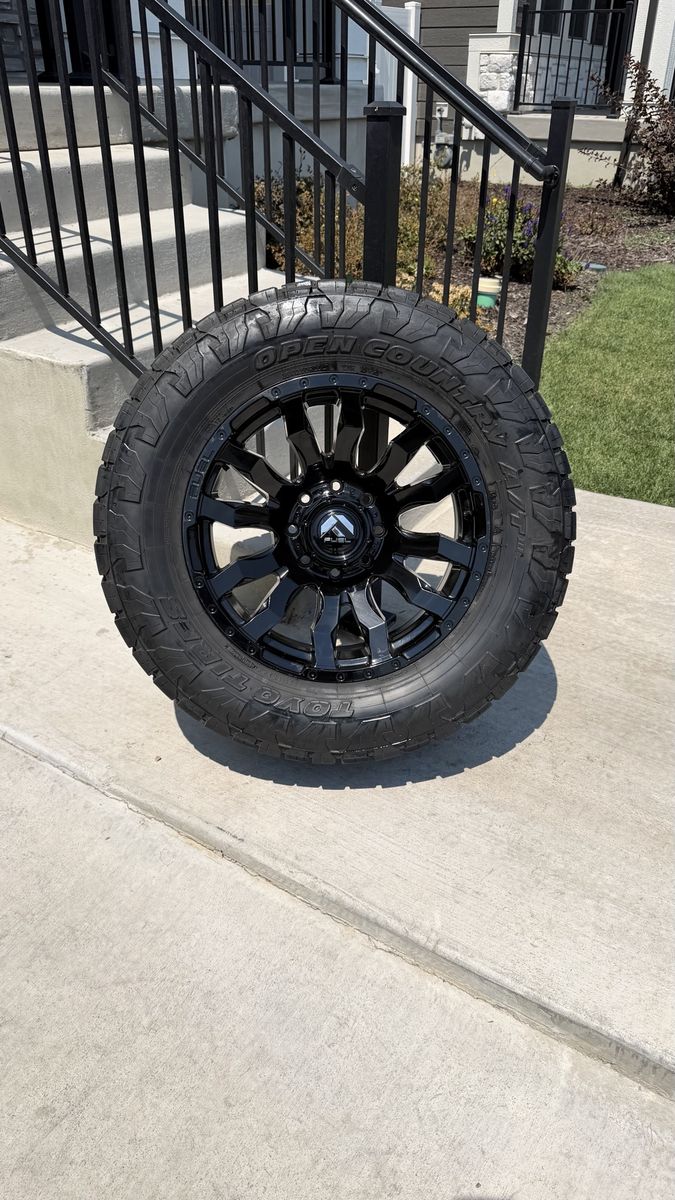 Dodge Ram 3500 Rims and Tires 35/12.50R20 Toyo AT3 Load E