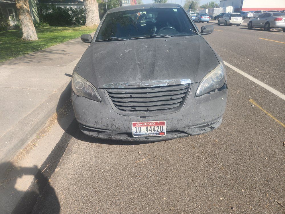 Chrysler 200 Sedan - Running Condition, Minor Damage, Idaho Plates