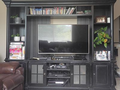 Large Black Entertainment Center TV Stand with Side Shelves, Storage Cabinets, and Display Space
