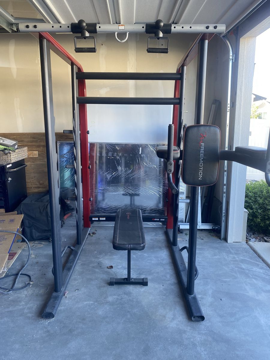 FreeMotion Squat Rack with Bench and Barbell Weight Set - Home Gym Equipment