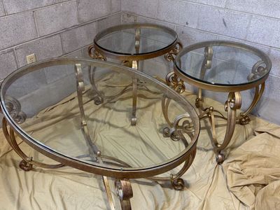 4 piece high-end gold and glass top table set.