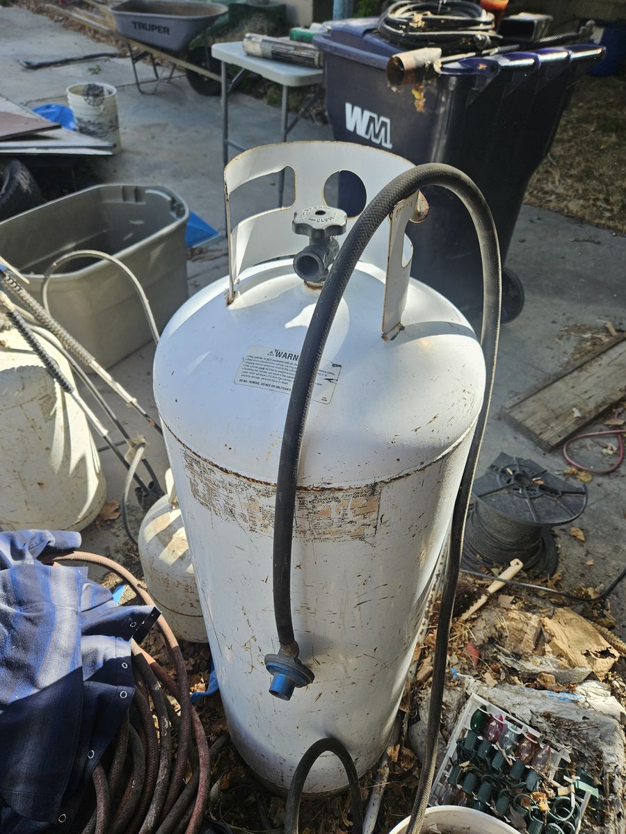 Propane Tanks 100 lb, 30 lb,, and three 20 lb.