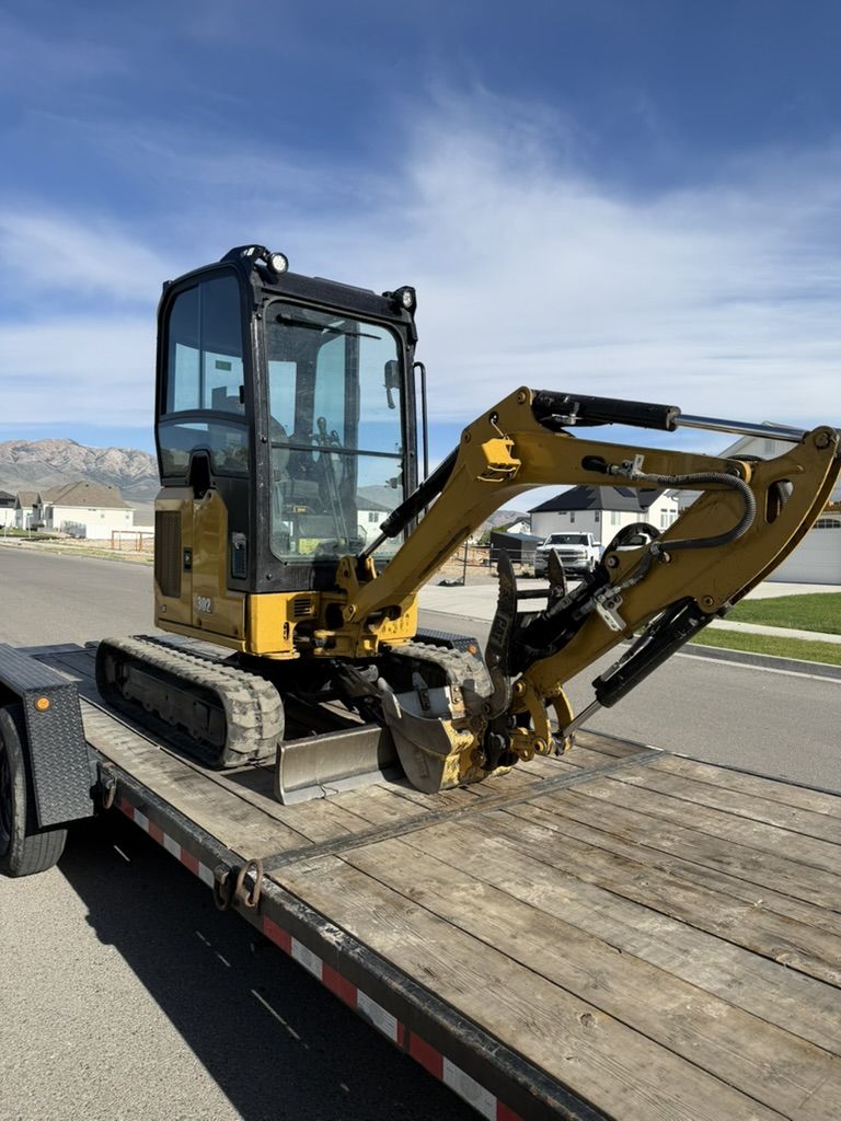 Cat 302 Mini Excavator 2 Ton Mini Ex for Rent - Retracts to 44 Inches Wide