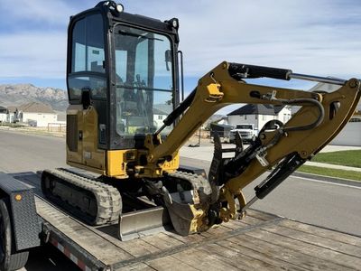 Cat 302 Mini Excavator 2 Ton Mini Ex for Rent - Retracts to 44 Inches Wide