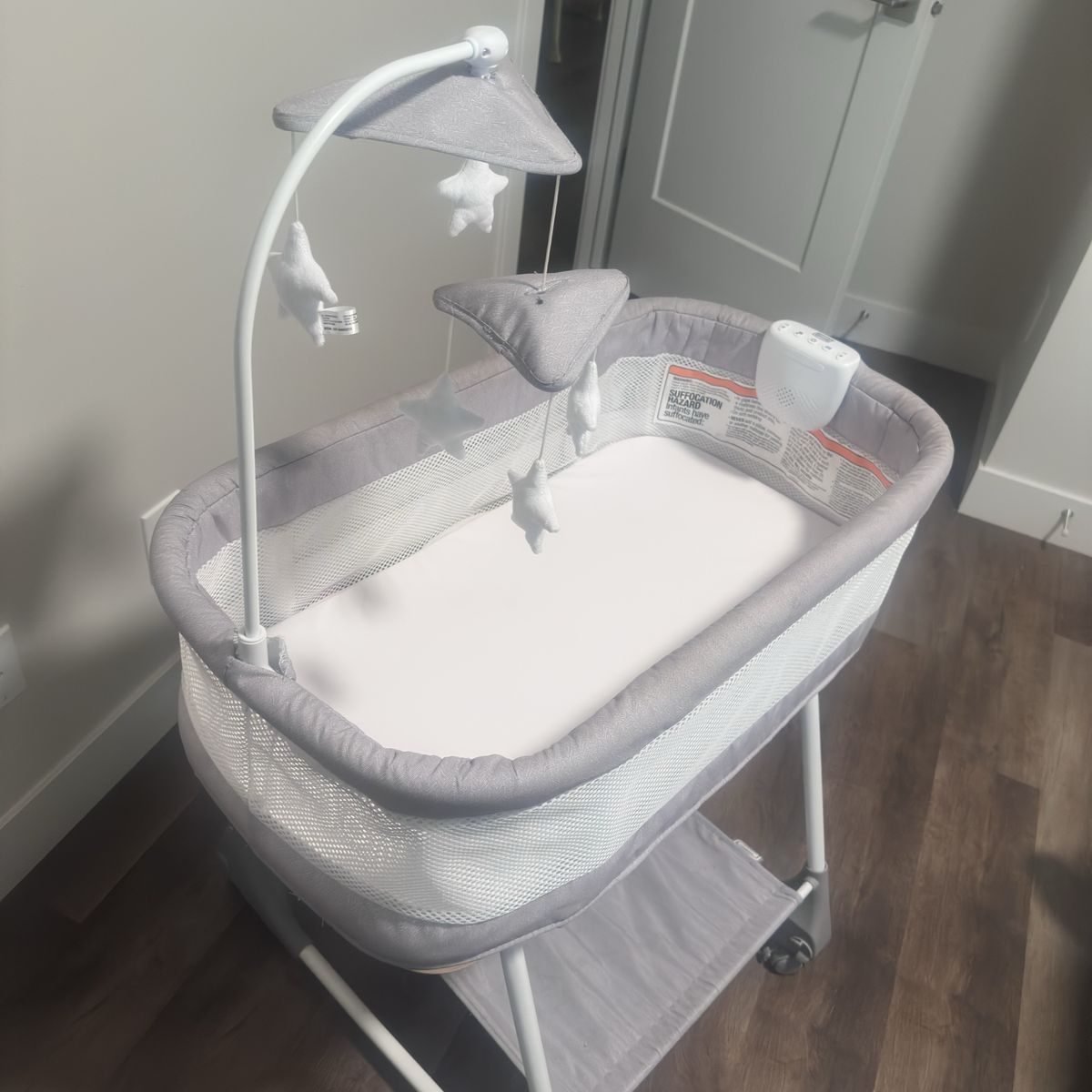 Ingenuity Dream & Grow Bedside Bassinet - Portable Baby Sleeper with Mobile, Adjustable Height, Gray
