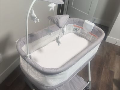 Ingenuity Dream & Grow Bedside Bassinet - Portable Baby Sleeper with Mobile, Adjustable Height, Gray