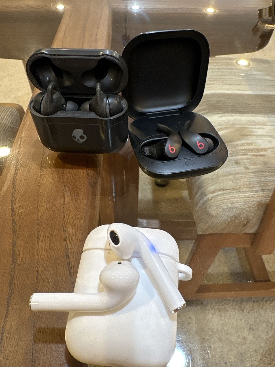 Skullcandy, Beats by Dre, and Generic Wireless Earbuds with Charging Casest