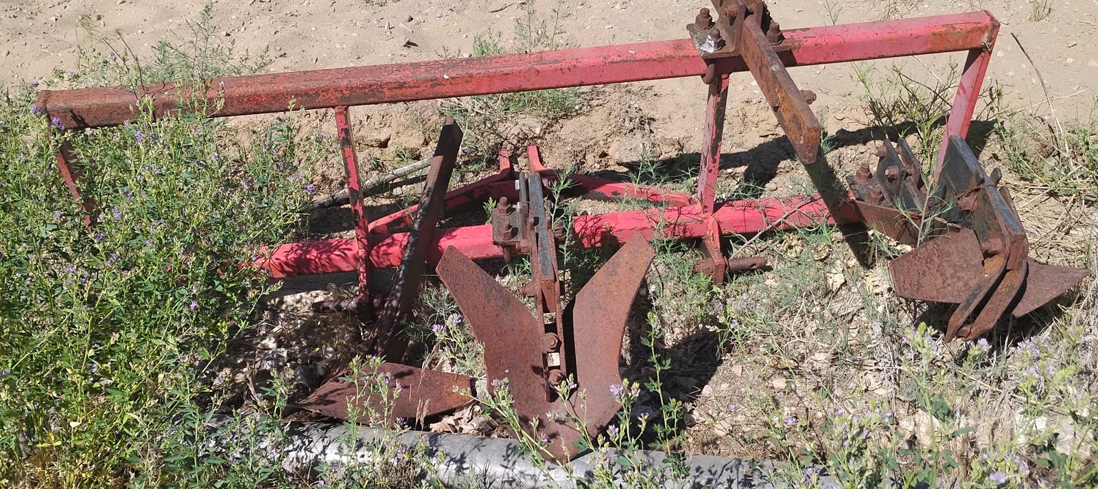 Used three-bottom plow, tiller implement