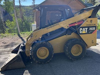 Skidsters, dump trailers, mini ex and flat bed tra