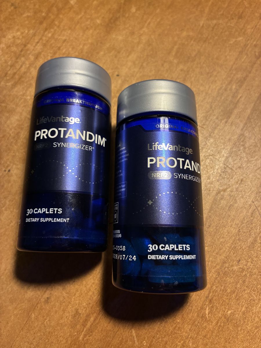 Pair of Protandim Bottles