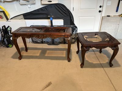 Set of vintage mahogany Chippendale style tables feature Queen Anne legs with ball and claw feet and inset glass tops.
