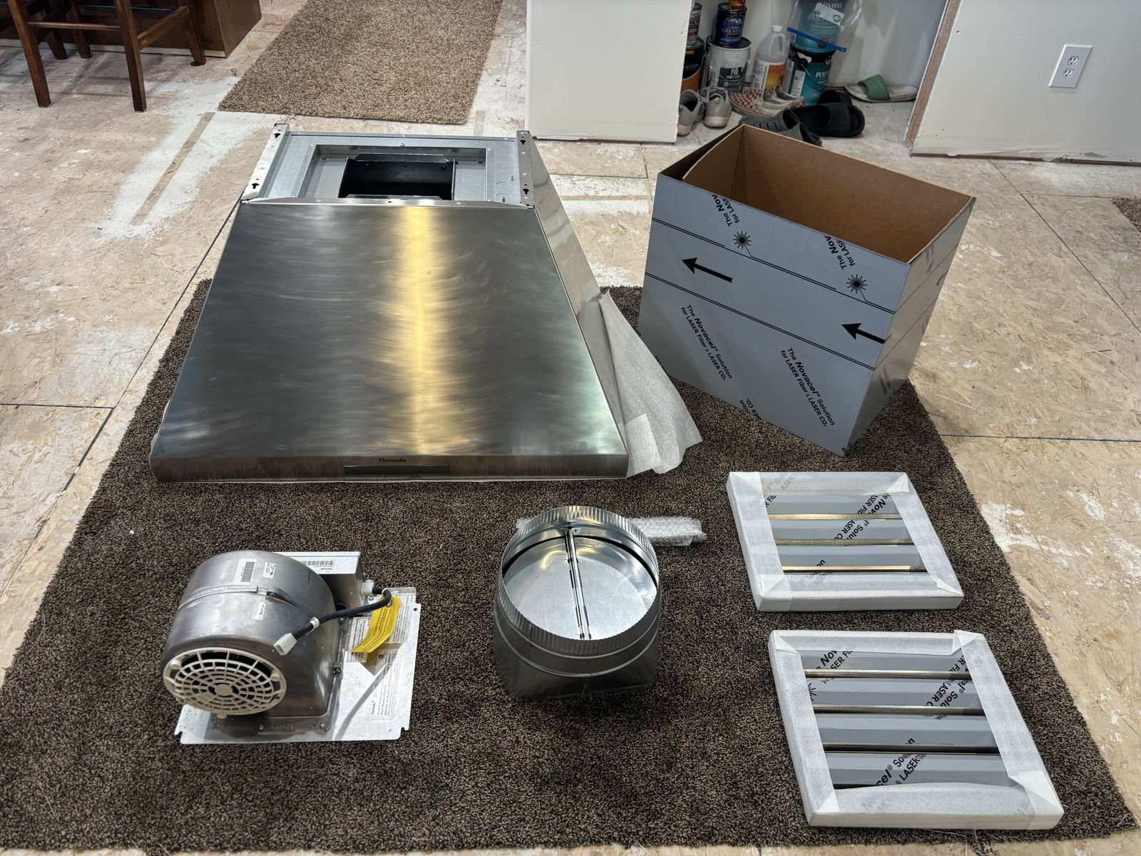 New Never used Thermador Range Hood complete with 600 cfm motor, 10” damper adapter, grease baffles, 2-18” trunk flue.