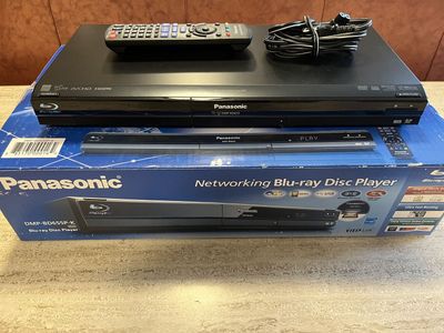 PANASONIC Blu-ray DVD Player and about 45 DVDs