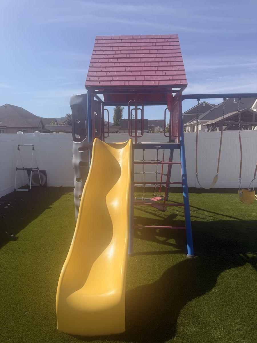 Lifetime Adventure Tower Playset - Yellow Slide, Swings, Climbing Wall, & Rock Climbing Wall