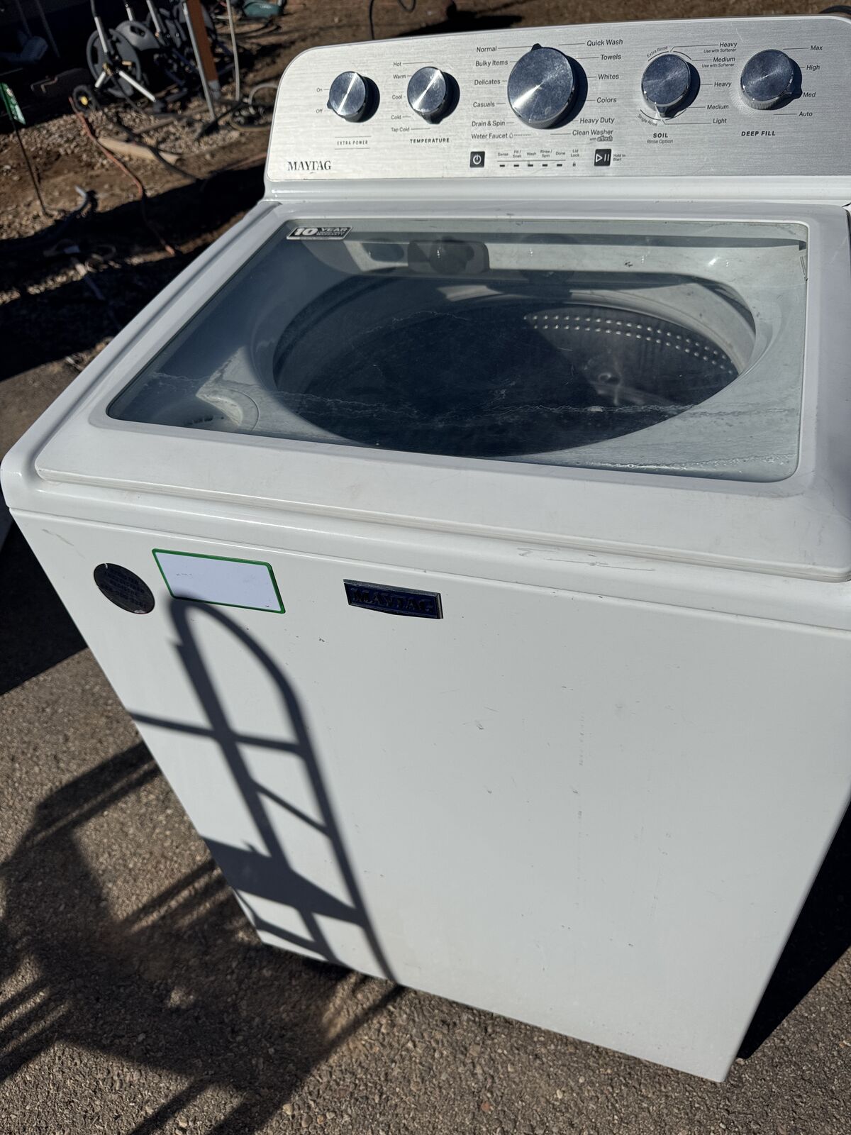 Maytag washer just over a year old works great. 4.8 cu. ft.