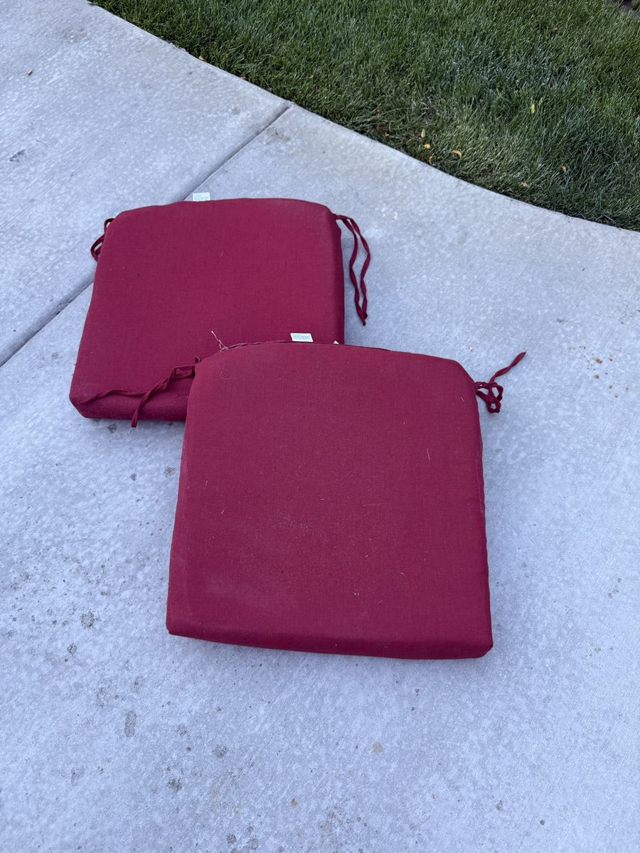 Wine colored red outdoor chair cushions $20 set of 2. 20 X 20