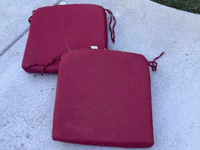 Wine colored red outdoor chair cushions $20 set of 2. 20 X 20