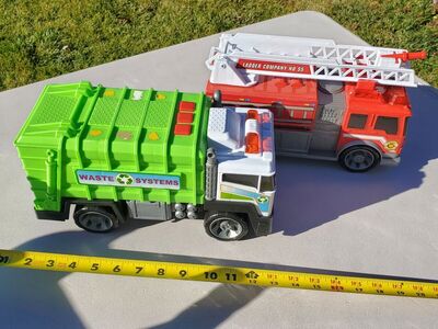 Toy garbage truck and fire truck