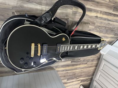 Epiphone Les Paul Custom Electric Guitar Black Gold Hardware with Original Soft Padded Case.