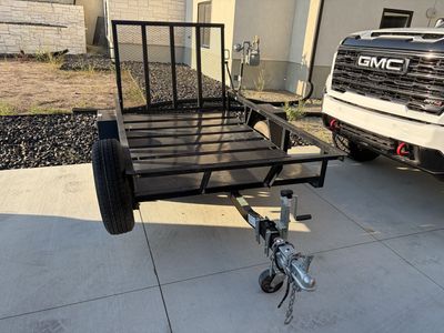 2022 Echo 4.5 foot x 8 foot metal trailer with ramp.