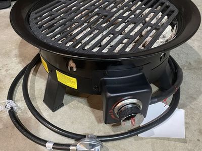 Propane fire pit with bag and mat