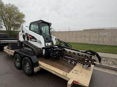 Track Skid Steer Rental – Bobcat T595 + Trencher – Built for Production – Heavy Duty trenching combo