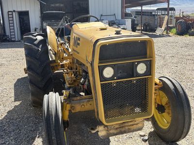 Tractor with brush mower