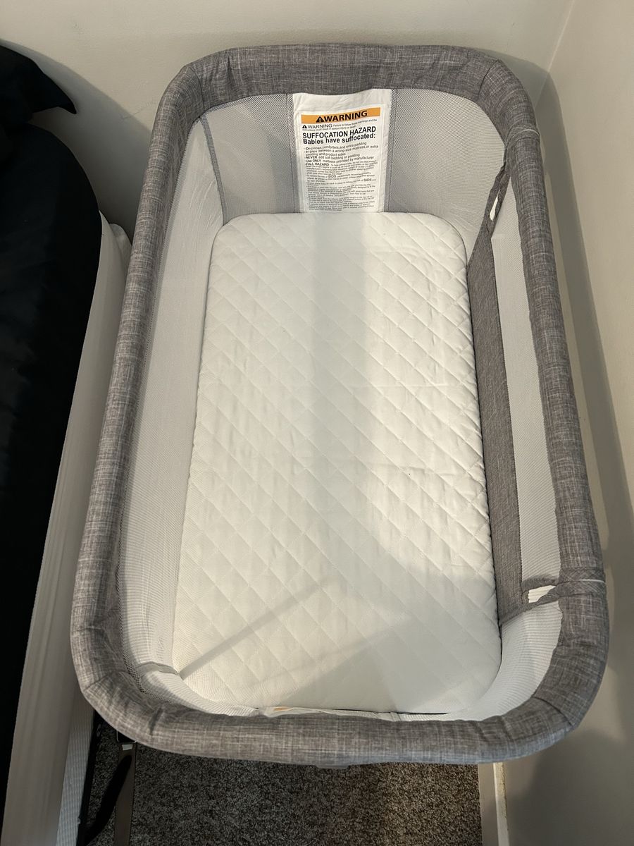 Gray Mesh Baby Bassinet with Mattress Pad and Wheels