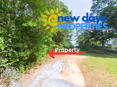 0.28 Acre Wooded Lot Near Lake!