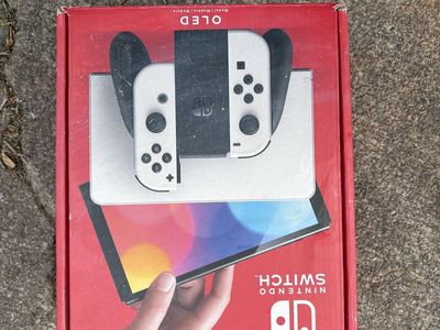 Nintendo Switch OLED - with all parts & cords)