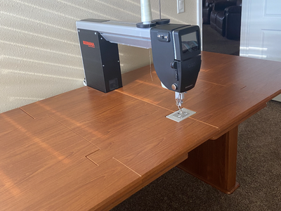 BERNINA sit-down long arm quilting machine w/ cabinet