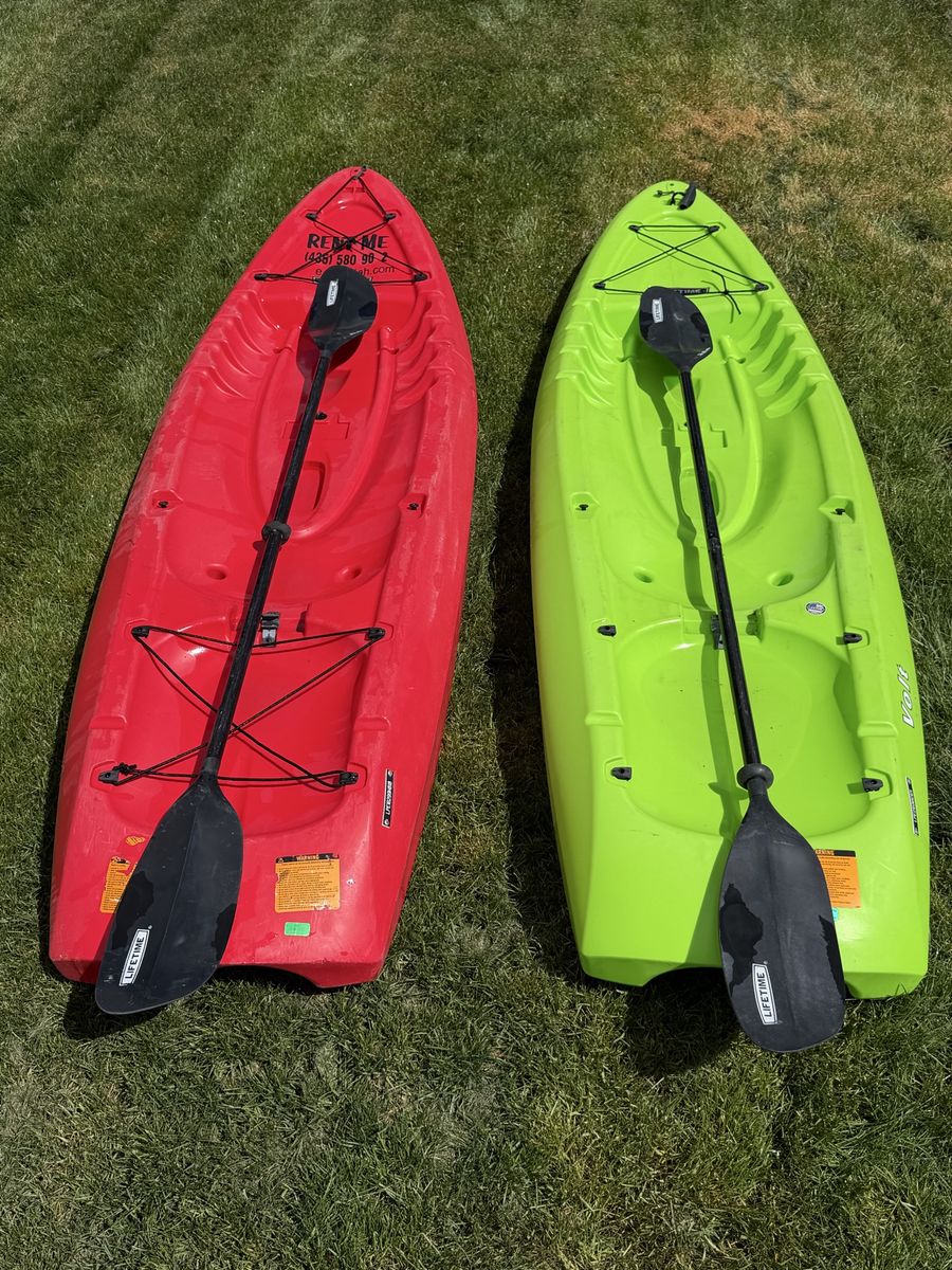 2 Lifetime kayaks 225lbs max W/ Paddles