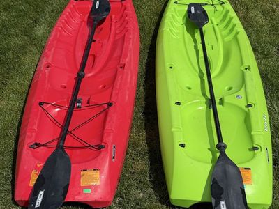 2 Lifetime kayaks 225lbs max W/ Paddles