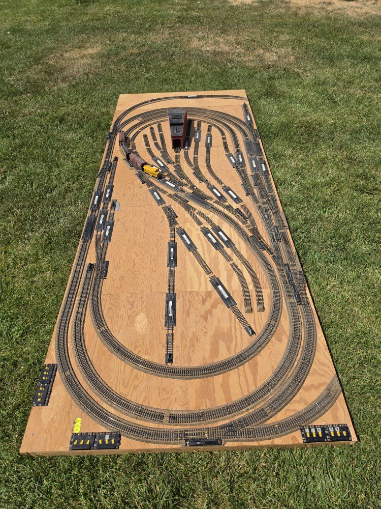 Large Model Train Layout with Tracks, Engine, and Buildings - Perfect for Enthusiasts