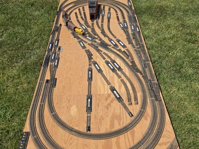 Large Model Train Layout with Tracks, Engine, and Buildings - Perfect for Enthusiasts