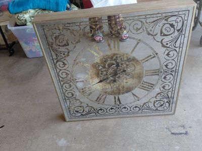 large mirrored gear clock