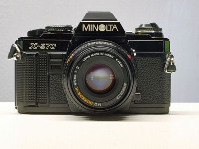 Minolta X-570 35mm Camera w/ lenses
