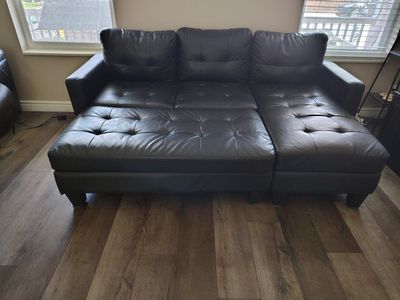 Black Tufted Leather Sectional Sofa with Ottoman - Minor Wear, Great for Living Room