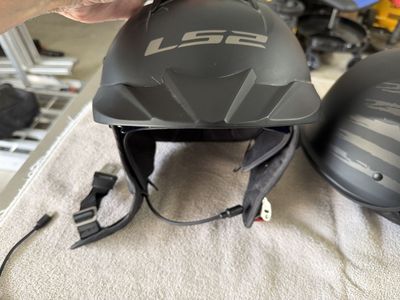 LS2 Matte Black Motorcycle Helmet with Integrated Sun Visor and Flag Graphic
