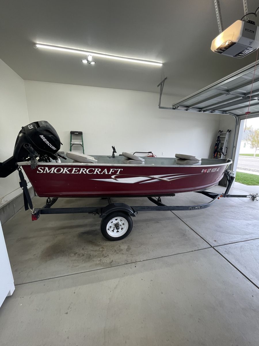 Smoker Craft 14ft. V hull w trailer and motor