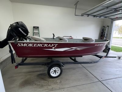 Smoker Craft 14ft. V hull w trailer and motor