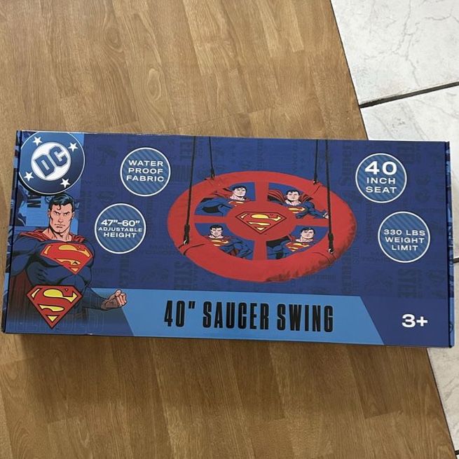 DC Comics Superman 40" Saucer Swing - Waterproof Fabric, Adjustable Height, 330 lbs Weight Limit