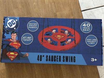 DC Comics Superman 40" Saucer Swing - Waterproof Fabric, Adjustable Height, 330 lbs Weight Limit