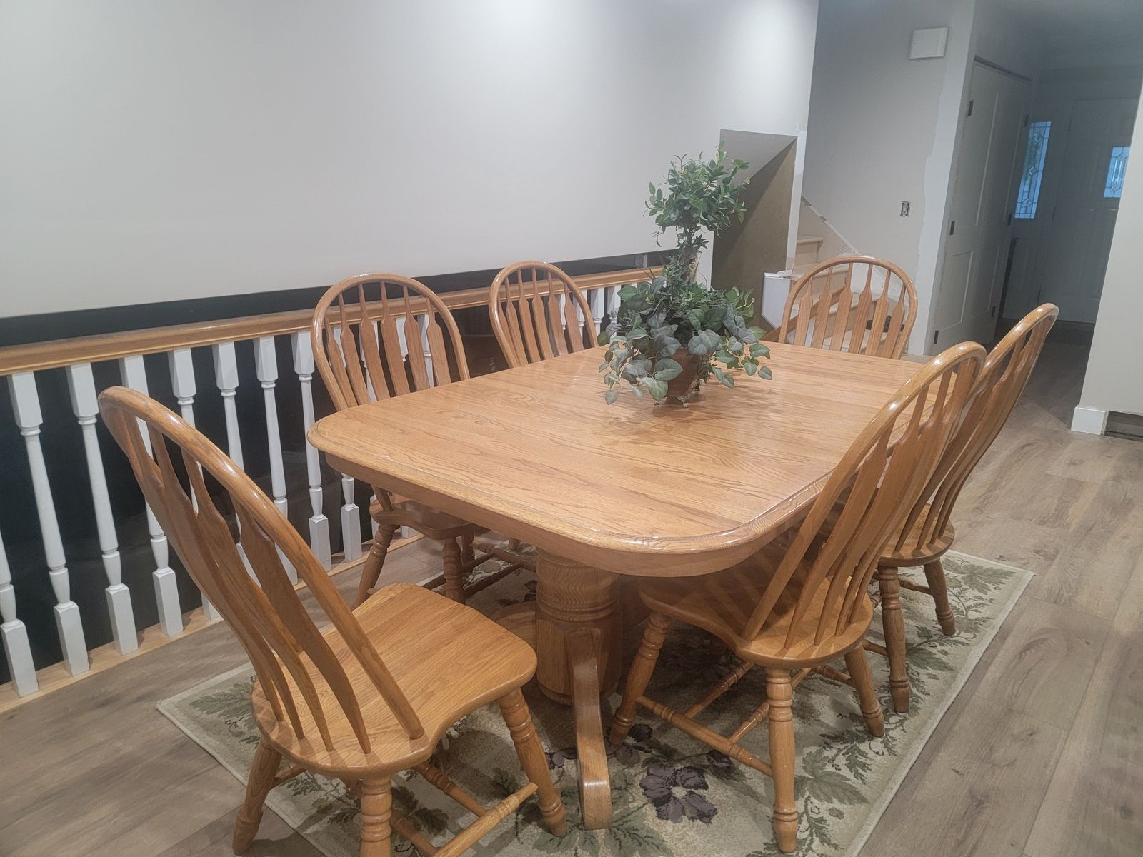 Oak Dining Table with 8 Spindle-Back Chairs